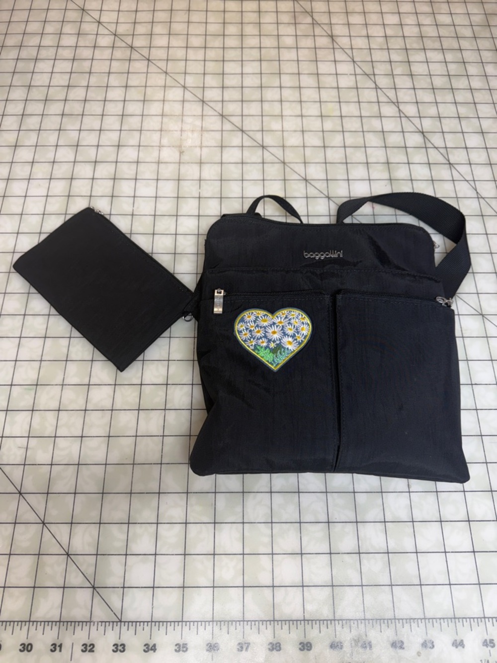 Baggallini Black Crossbody with Floral Heart Patch Accent